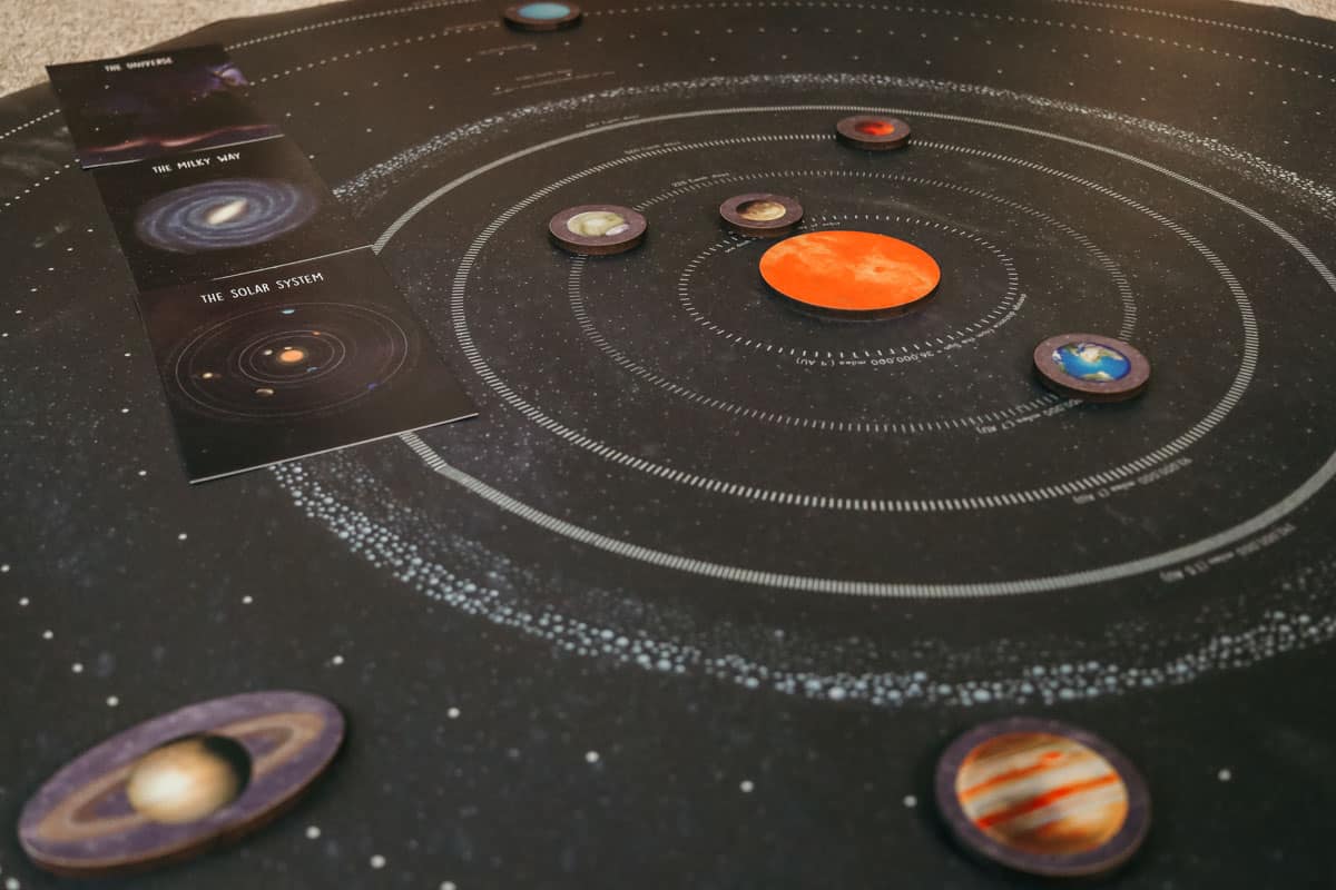Waseca Biomes Solar System Mat with fact file cards and wooden parts of the solar system