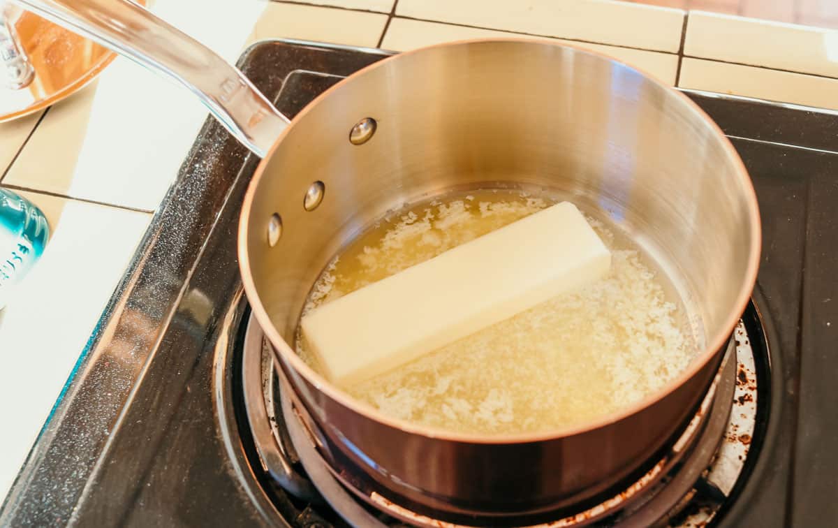 butter melting in a copper saucepan